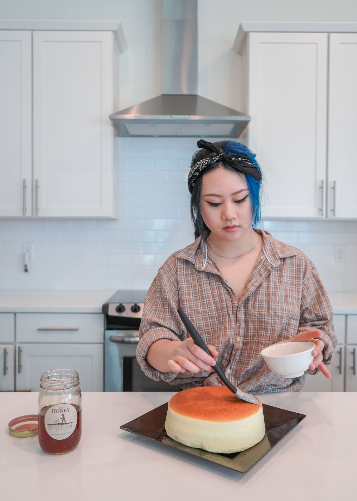 Finishing cake off with local Honey.jpg